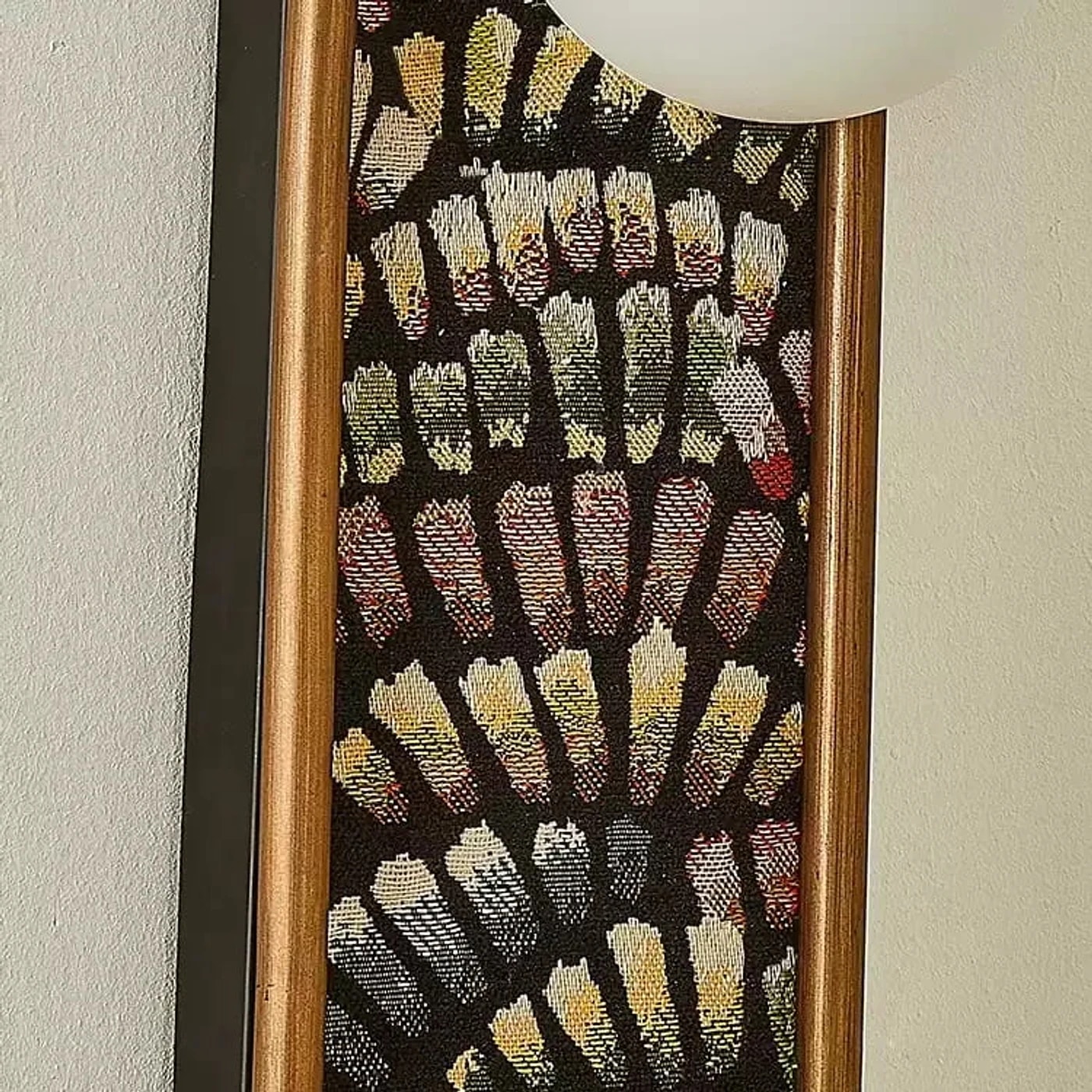Close detail of fabric texture and warm metal edge