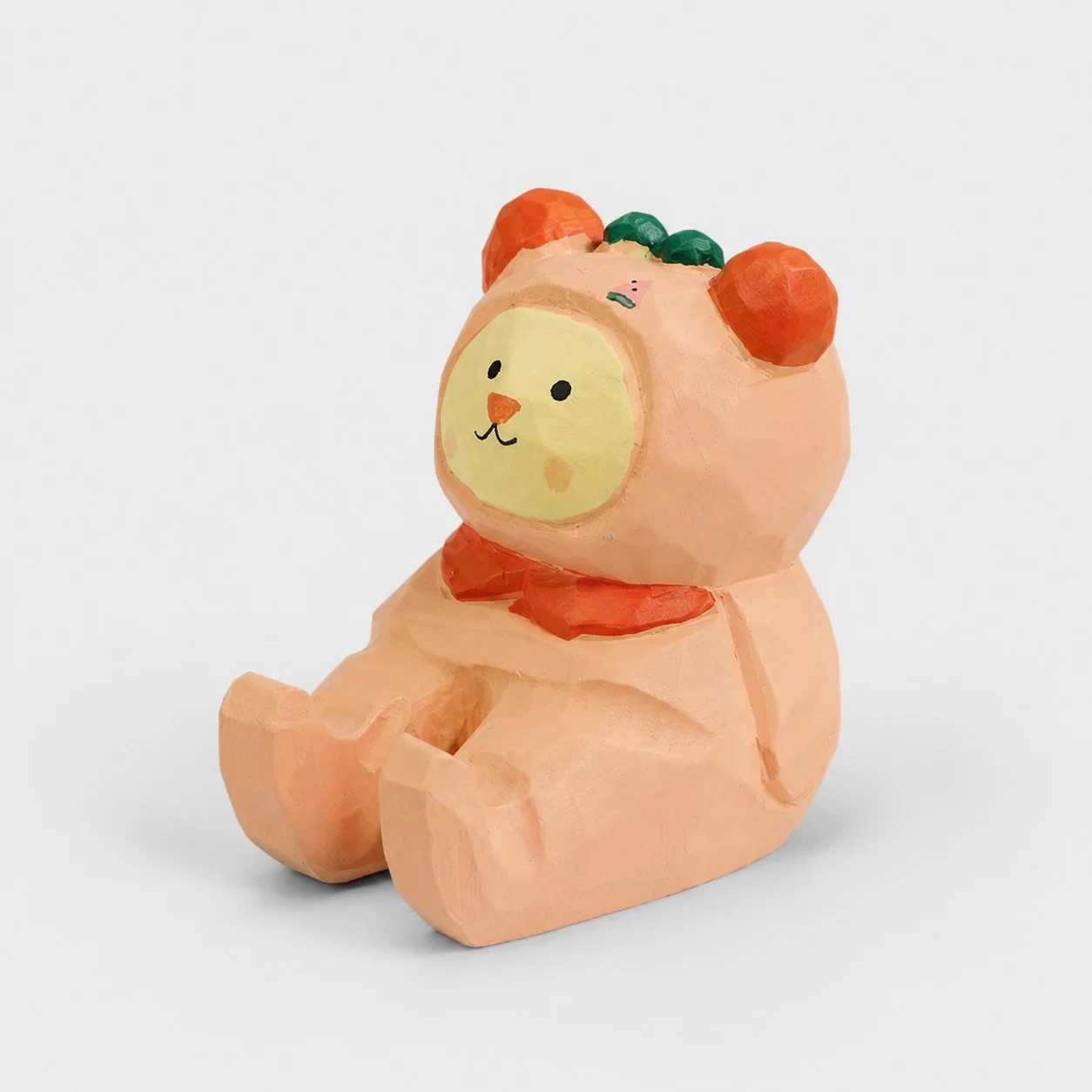 Support de téléphone en bois sculpté à la main en forme d'ours rose