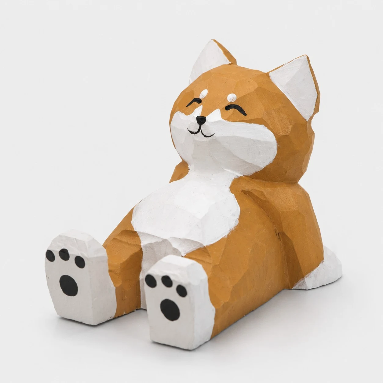 Support de téléphone en bois sculpté à la main représentant un Shiba Inu couché