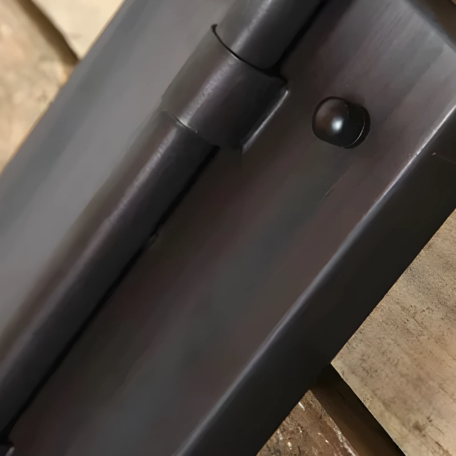 Matte black wall plate and side hardware detail